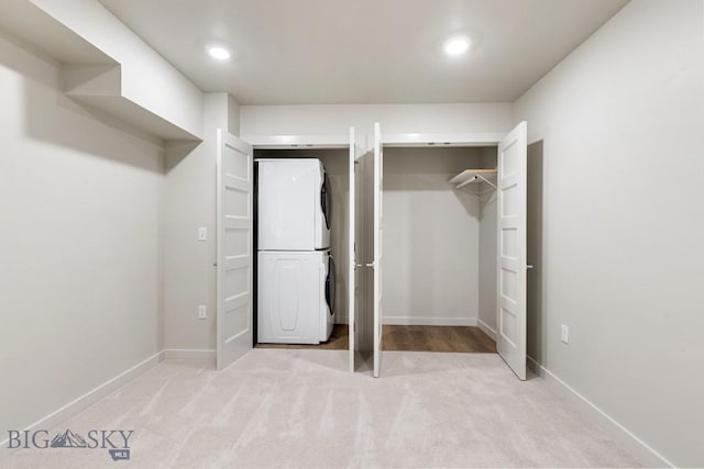 59 E Park St Unit 204, Butte, MT 59701 - interior space featuring light colored carpet and stacked washer / dryer