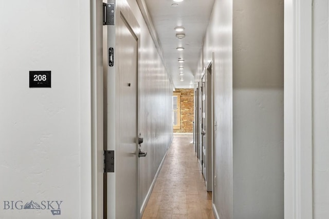 corridor featuring light hardwood / wood-style flooring