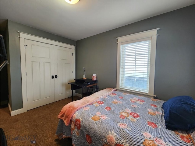 carpeted bedroom with a closet