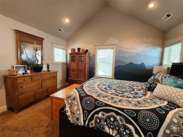 bedroom featuring lofted ceiling and carpet