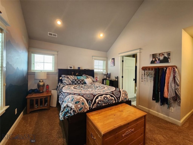 bedroom featuring high vaulted ceiling and dark carpet