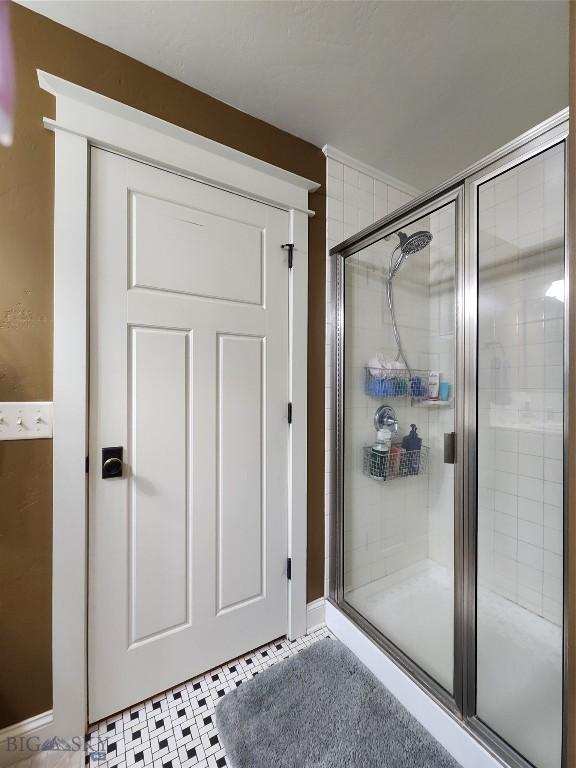 bathroom featuring walk in shower