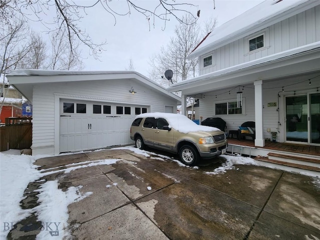 view of snow covered garage