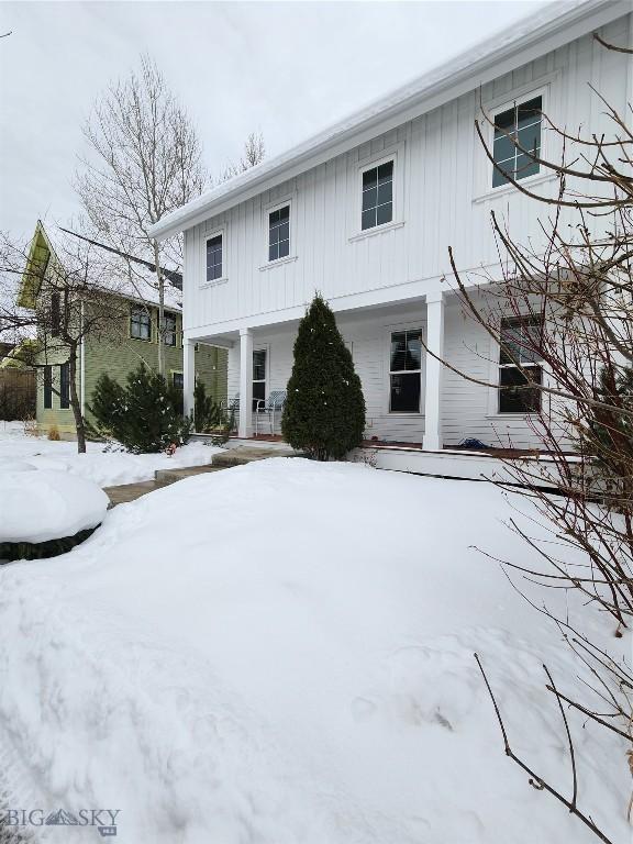 view of snow covered property