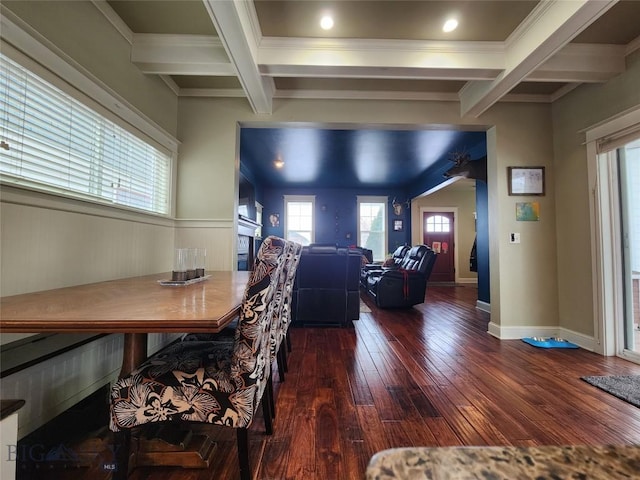 dining area with beamed ceiling, wood-type flooring, and coffered ceiling