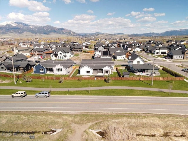 aerial view featuring a residential view and a mountain view