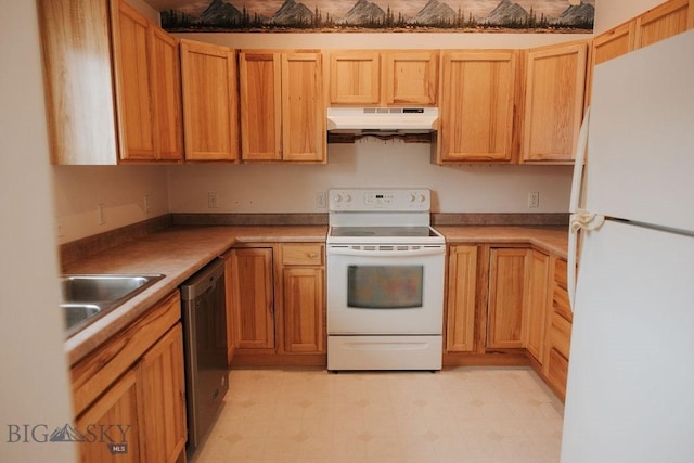 kitchen with sink and white appliances