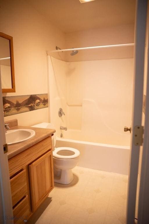 full bathroom featuring shower / bath combination, vanity, and toilet