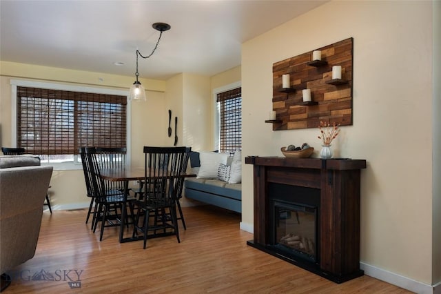 20 Talon Way Unit D, Bozeman, MT 59718 - dining space featuring healthy amount of natural light, wood finished floors, and baseboards