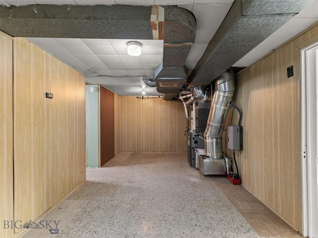 basement with wooden walls