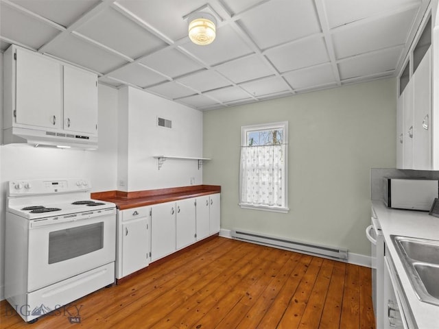 kitchen featuring white cabinetry, light hardwood / wood-style floors, baseboard heating, and white range with electric cooktop