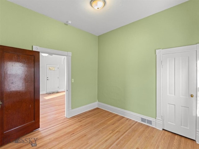 empty room featuring light hardwood / wood-style flooring