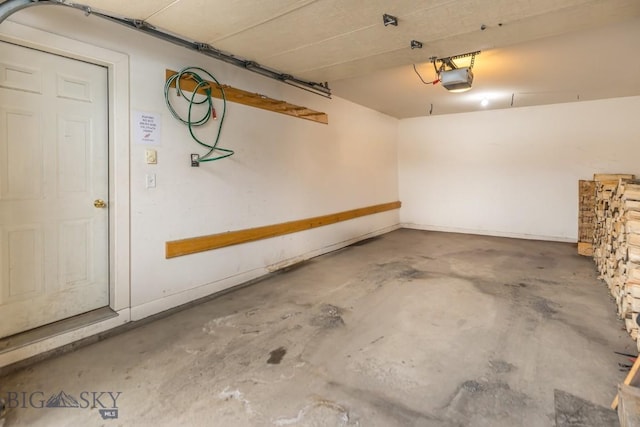 garage featuring a garage door opener