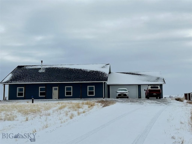 single story home featuring a garage