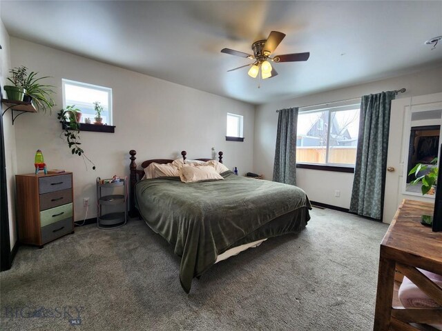 bedroom featuring baseboards, a ceiling fan, and carpet floors