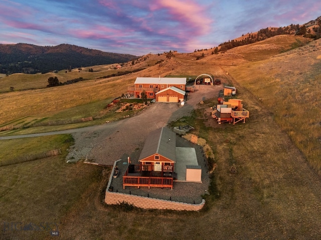 aerial view at dusk with a mountain view