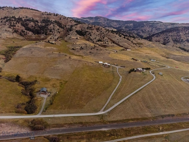 aerial view at dusk with a mountain view