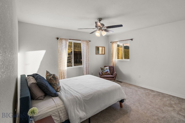 bedroom featuring ceiling fan and carpet flooring