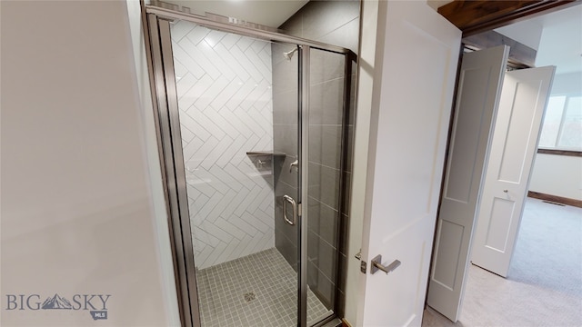 bathroom featuring walk in shower