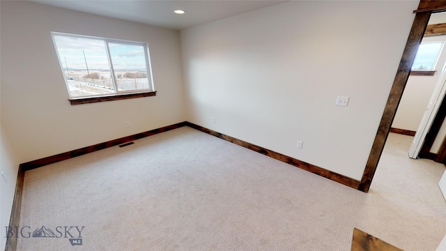 view of carpeted spare room