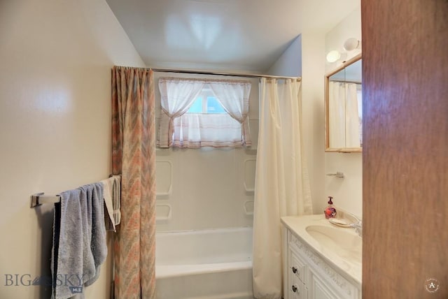 bathroom featuring vanity and shower / tub combo