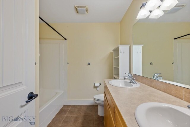 full bathroom with tile patterned flooring, vanity, toilet, and washtub / shower combination