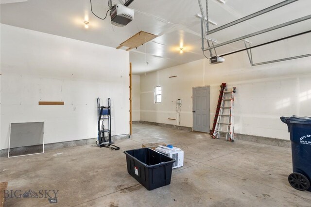 garage featuring a garage door opener