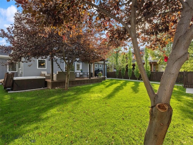 view of yard featuring a hot tub