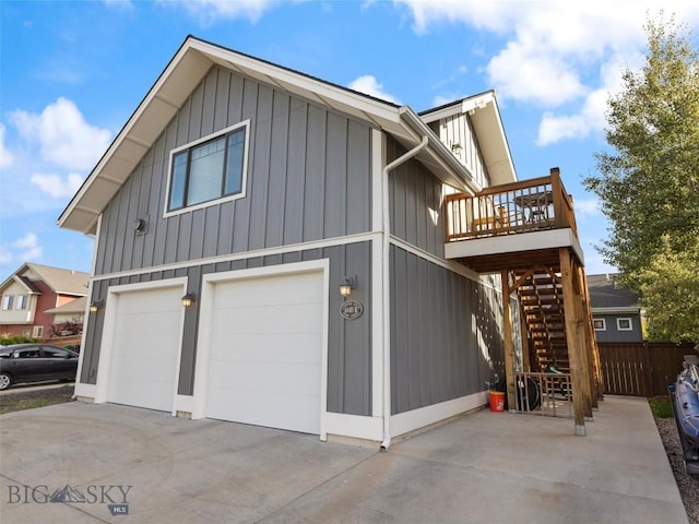 view of side of home featuring a garage