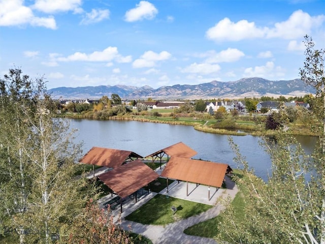 view of dock featuring a water and mountain view