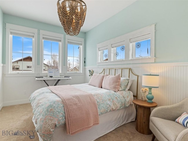 bedroom with light colored carpet