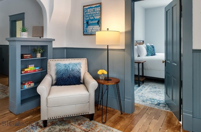 living area featuring hardwood / wood-style floors