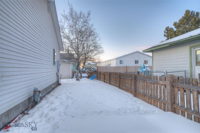 view of yard covered in snow