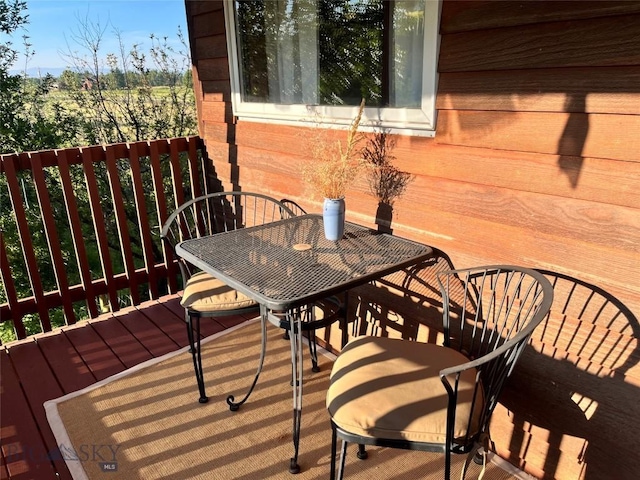 2225 Stagecoach Trail Rd, Manhattan, MT 59741 - wooden deck with outdoor dining space