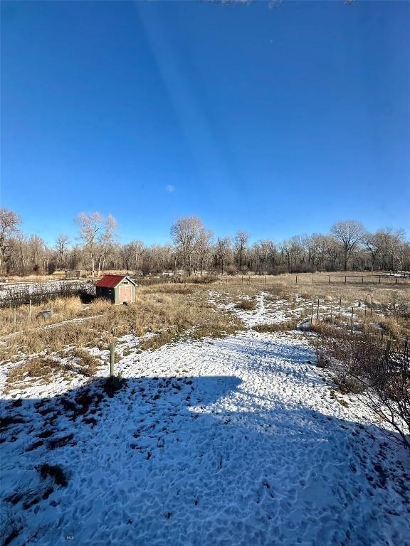 2225 Stagecoach Trail Rd, Manhattan, MT 59741 - snowy yard featuring a view of countryside