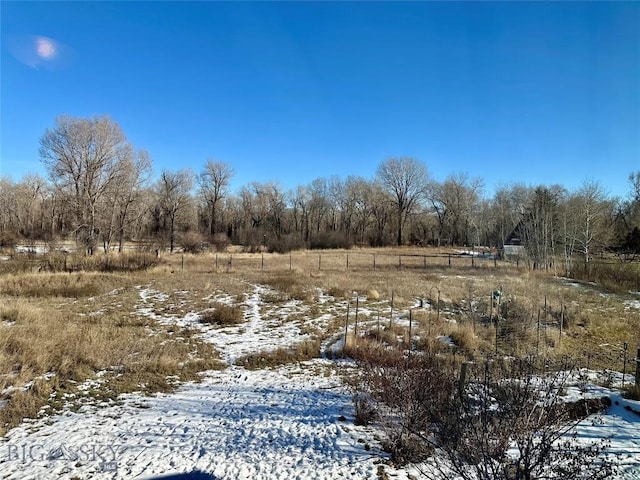 view of snow covered land