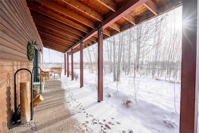 view of snow covered deck