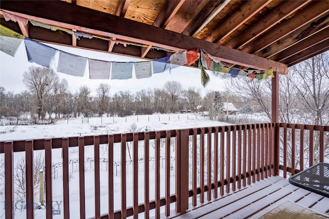 2225 Stagecoach Trail Rd, Manhattan, MT 59741 - snow covered deck featuring view of wooded area