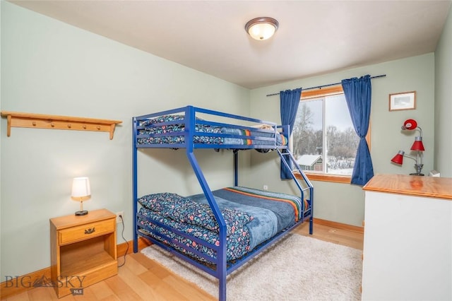 bedroom featuring hardwood / wood-style floors