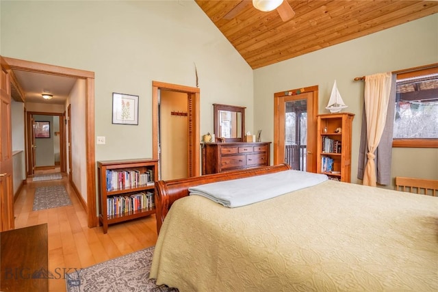 bedroom with wood ceiling, ceiling fan, high vaulted ceiling, and light hardwood / wood-style flooring