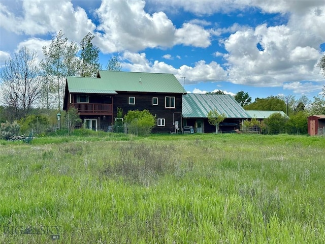 2225 Stagecoach Trail Rd, Manhattan, MT 59741 - back of house with metal roof