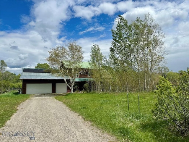 2225 Stagecoach Trail Rd, Manhattan, MT 59741 - view of property hidden behind natural elements with metal roof and gravel driveway