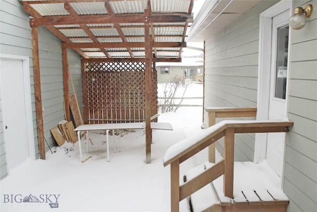 view of snow covered deck