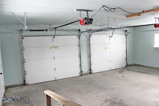 garage featuring a garage door opener