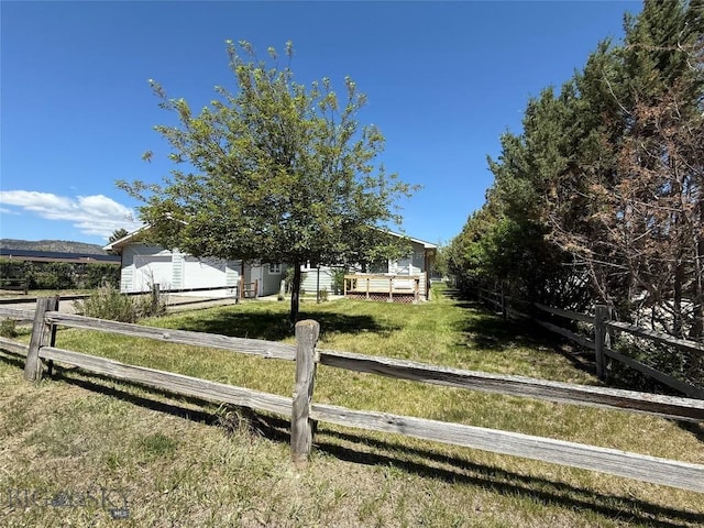 218 W Armitage St, Ennis, MT 59729 - view of front of home with a wooden deck