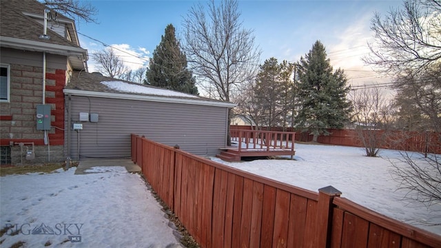 view of snow covered deck