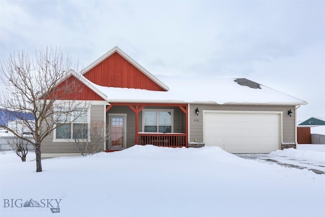 view of front facade with a garage and board and batten siding