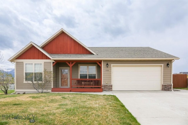 craftsman-style home featuring driveway, a porch, an attached garage, a shingled roof, and a front yard