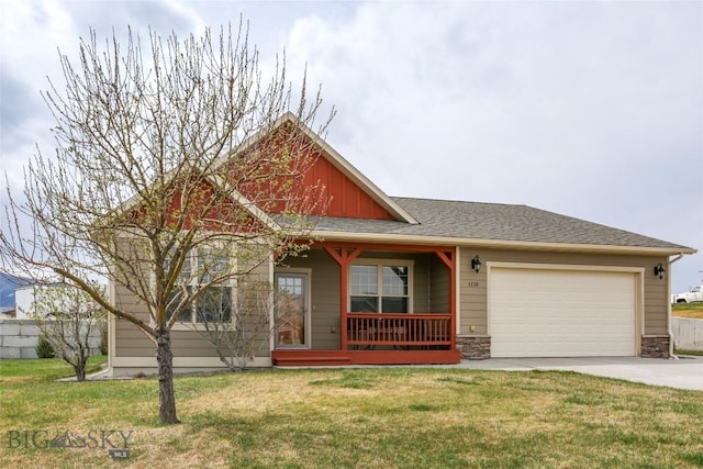 view of front of property with concrete driveway, stone siding, covered porch, an attached garage, and a front yard