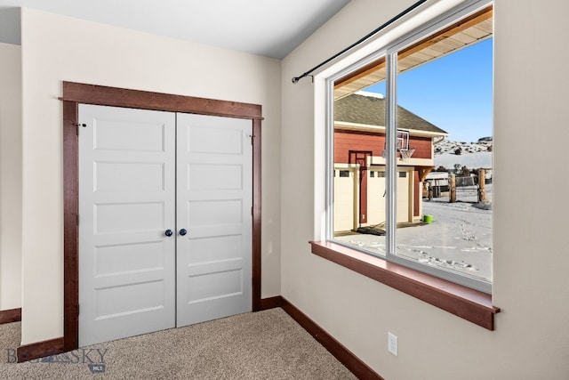 carpeted bedroom featuring access to outside